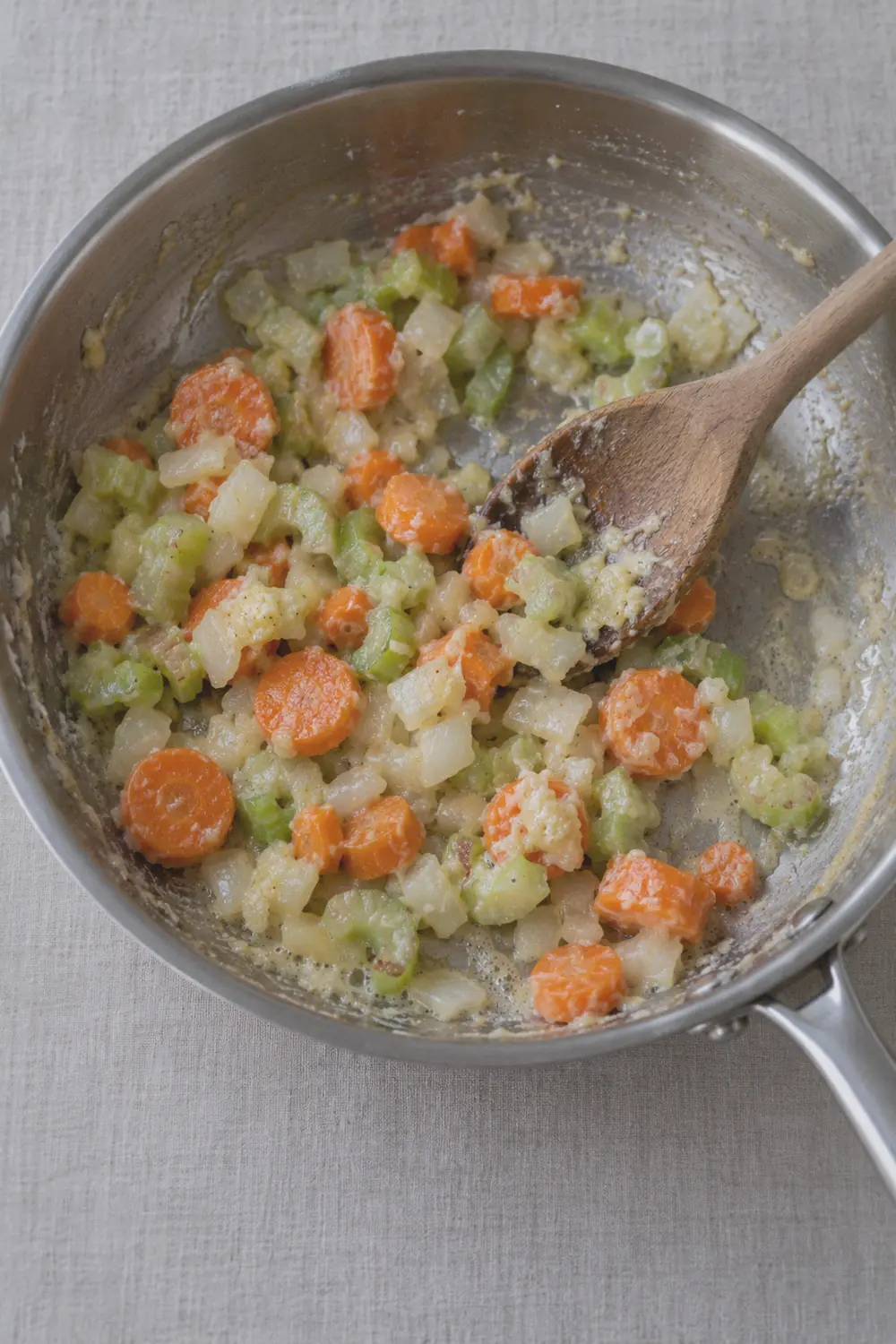 Building the roux with vegetables in a skillet